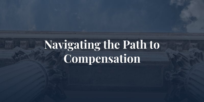 outside of courtroom with caption: navigate the path to compensation