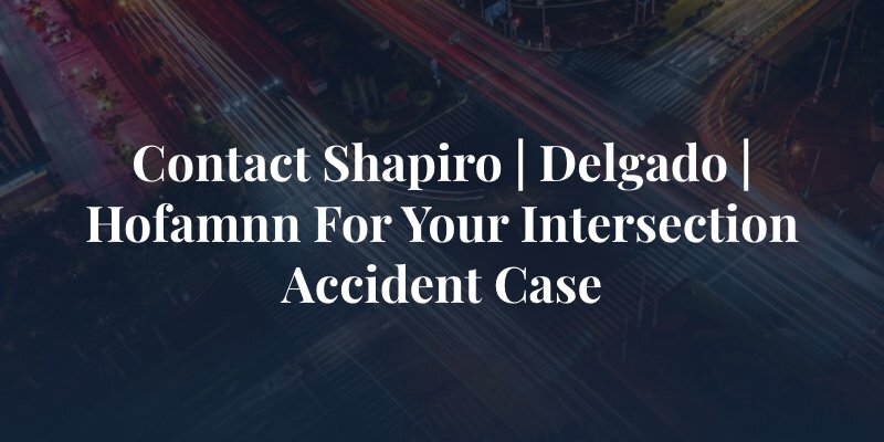 timelapse of busy intersection with the caption: "contact Shapiro | Delgado for your intersection accident case"